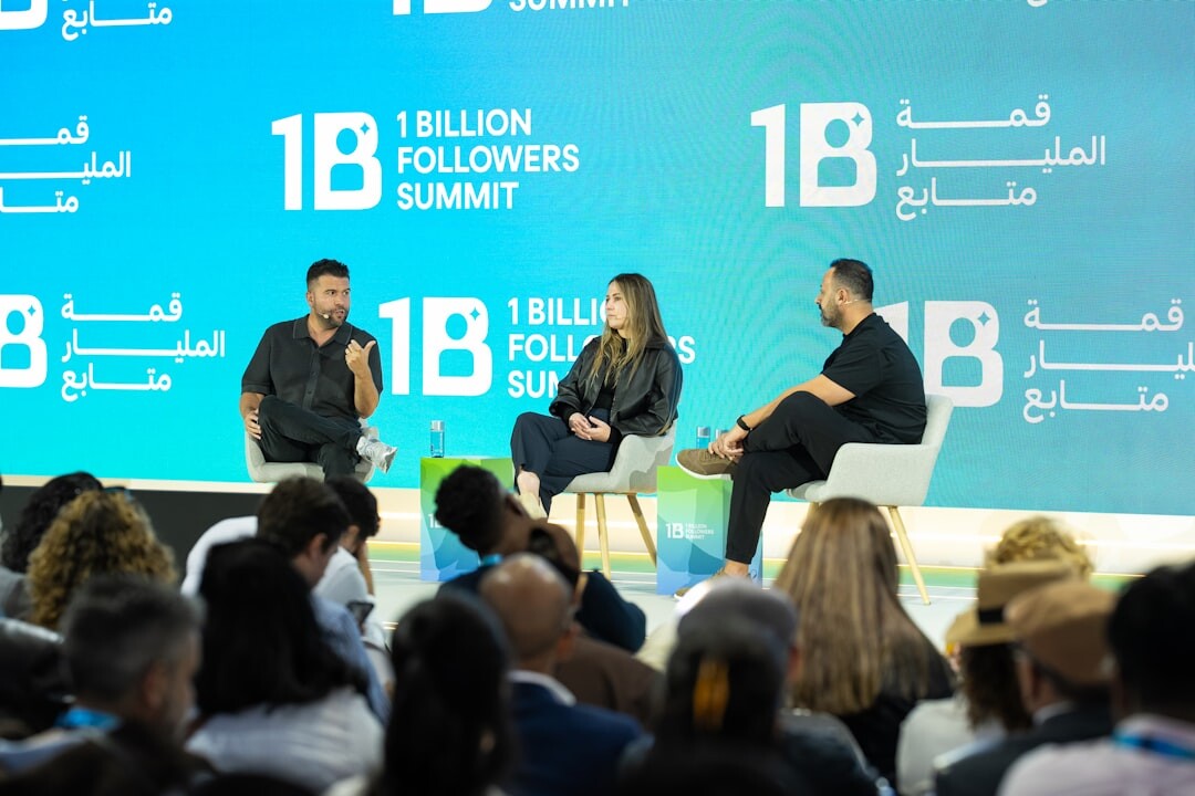 Panel discussion with multiple speakers on stage